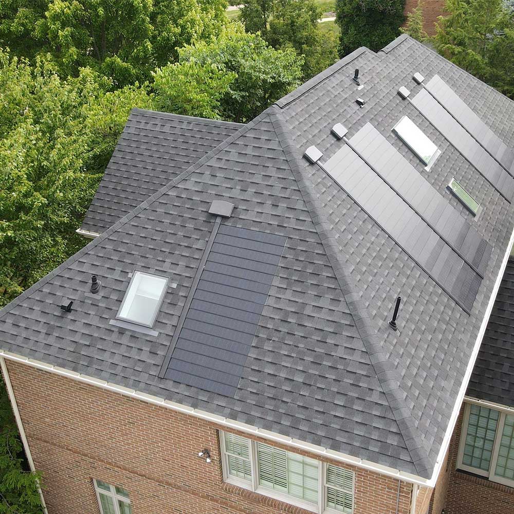 Aerial view of a home with Resnick integrated solar shingles