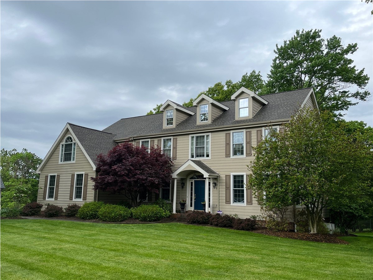 Resnick Roofing & Contracting Installs Integrated Solar Shingles at a Home in Monroeville, PA.