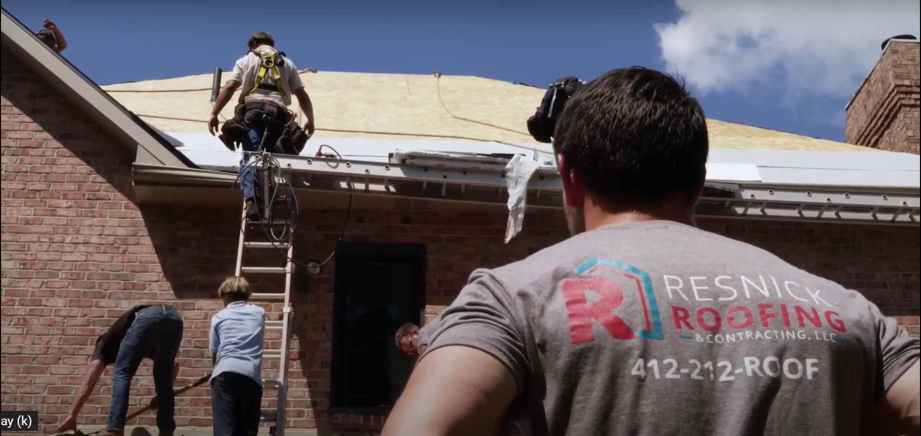 Resnick Roofing crew installing a residential roof